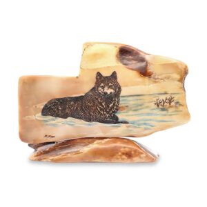 Laying Wolf Scrimshaw Artwork Fossil Ivory , Alaska Mint